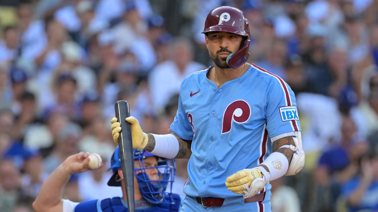 Oct 9, 2025; Los Angeles, California, USA; Philadelphia Phillies right fielder Nick Castellanos (8) reacts after striking out in the fifth inning against the Los Angeles Dodgers during game four of the NLDS round for the 2025 MLB playoffs at Dodger Stadium. Mandatory Credit: Jayne Kamin-Oncea-Imagn Images