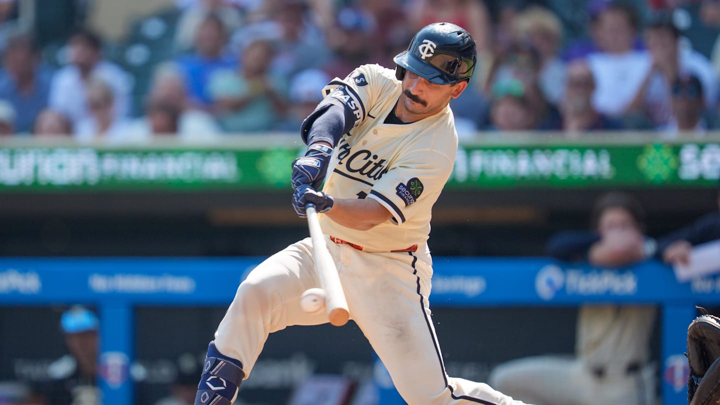 Sep 14, 2025; Minneapolis, Minnesota, USA; Minnesota Twins second base Mickey Gasper (11) grounds out on a pitch from Arizona Diamondbacks pitcher Nabil Crismatt (61) in the fourth inning at Target Field. Mandatory Credit: Matt Blewett-Imagn Images
