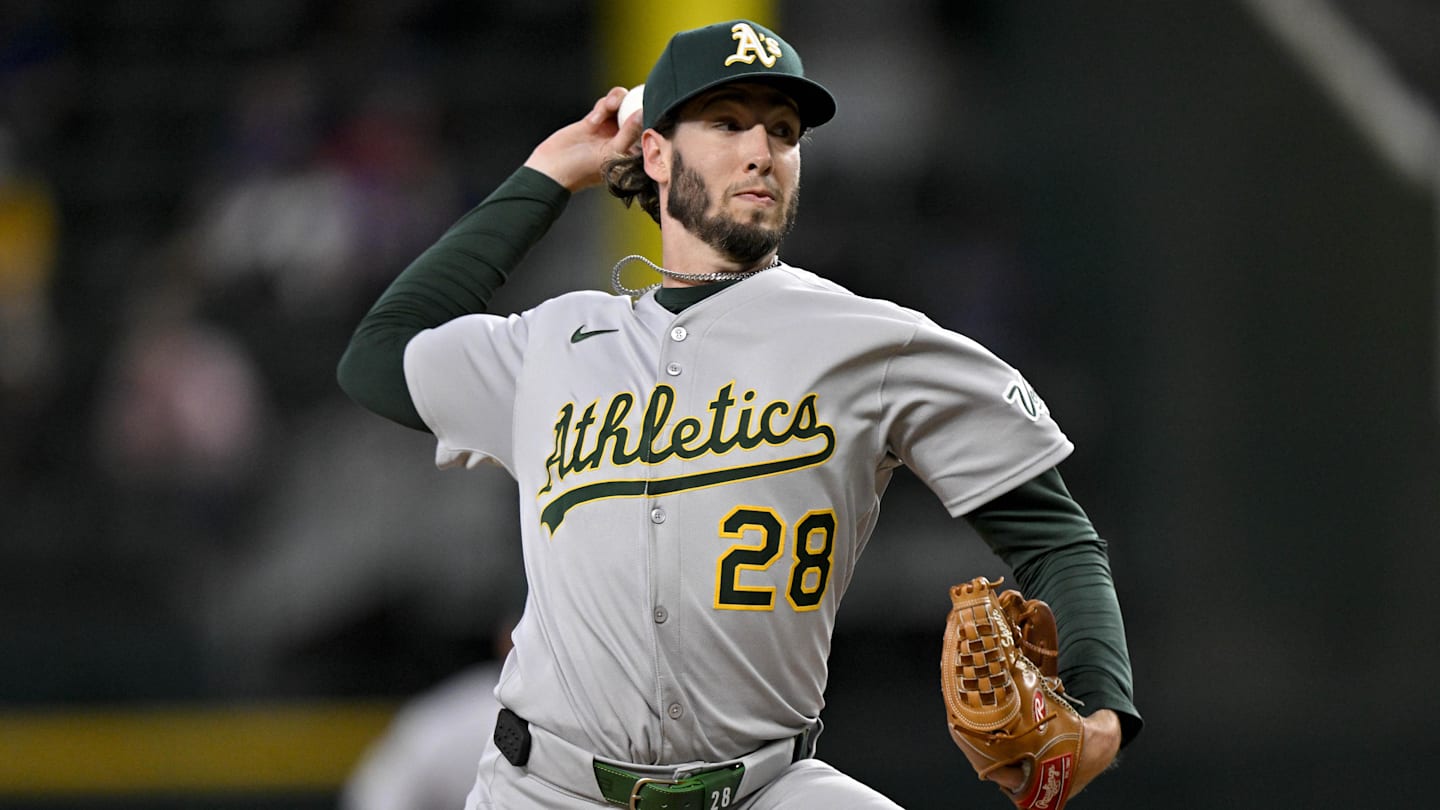 May 1, 2025; Arlington, Texas, USA; Athletics relief pitcher Mitch Spence (28) pitches against the Texas Rangers during the seventh inning at Globe Life Field. Mandatory Credit: Jerome Miron-Imagn Images
