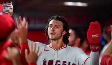Sep 9, 2025; Anaheim, California, USA; Los Angeles Angels center fielder Bryce Teodosio (22) is greeted after scoring a run against the Minnesota Twins during the sixth inning at Angel Stadium. Mandatory Credit: Gary A. Vasquez-Imagn Images