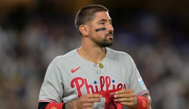 Sep 17, 2025; Los Angeles, California, USA;   Philadelphia Phillies right fielder Nick Castellanos (8) returns to the dugout after an out against the Los Angeles Dodgers at Dodger Stadium. Mandatory Credit: Jayne Kamin-Oncea-Imagn Images
