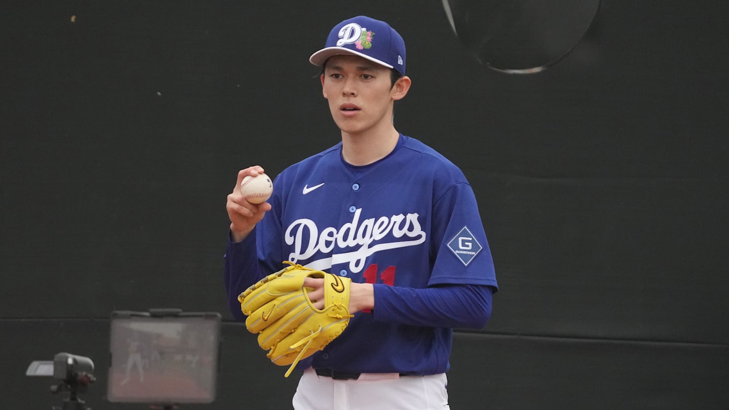 Feb 13, 2026; Glendale, AZ, USA; Los Angeles Dodgers pitcher Roki Sasaki (11) throws in the bullpen during spring training camp. Mandatory Credit: Rick Scuteri-Imagn Images