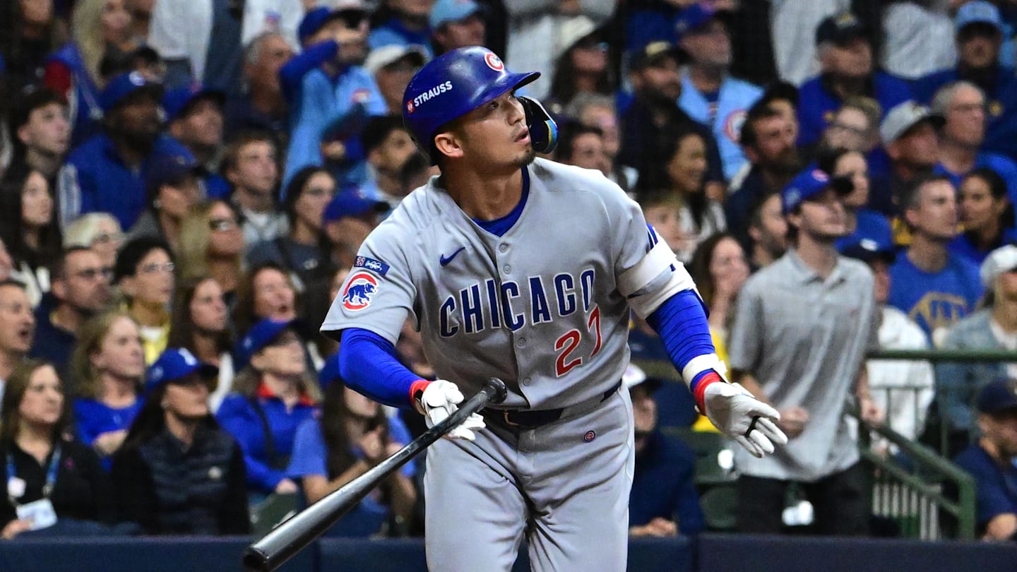 Oct 11, 2025; Milwaukee, Wisconsin, USA; Chicago Cubs right fielder Seiya Suzuki (27) hits a solo home run against the Milwaukee Brewers in the second inning during game five of the NLDS round for the 2025 MLB playoffs at American Family Field. Mandatory Credit: Benny Sieu-Imagn Images