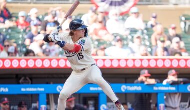 Sep 21, 2025; Minneapolis, Minnesota, USA; Minnesota Twins second base Luke Keaschall (15) at bat facing Cleveland Guardians pitcher Erik Sabrowski (62) in the seventh inning at Target Field. Mandatory Credit: Matt Blewett-Imagn Images