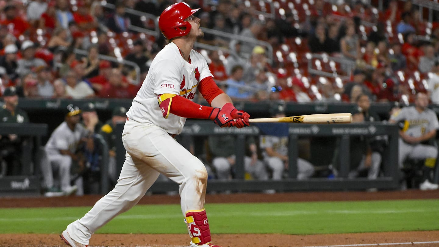 Sep 3, 2025; St. Louis, Missouri, USA;  St. Louis Cardinals third baseman Nolan Gorman (16) hits a solo home run against the Athletics during the seventh inning at Busch Stadium. Mandatory Credit: Jeff Curry-Imagn Images
