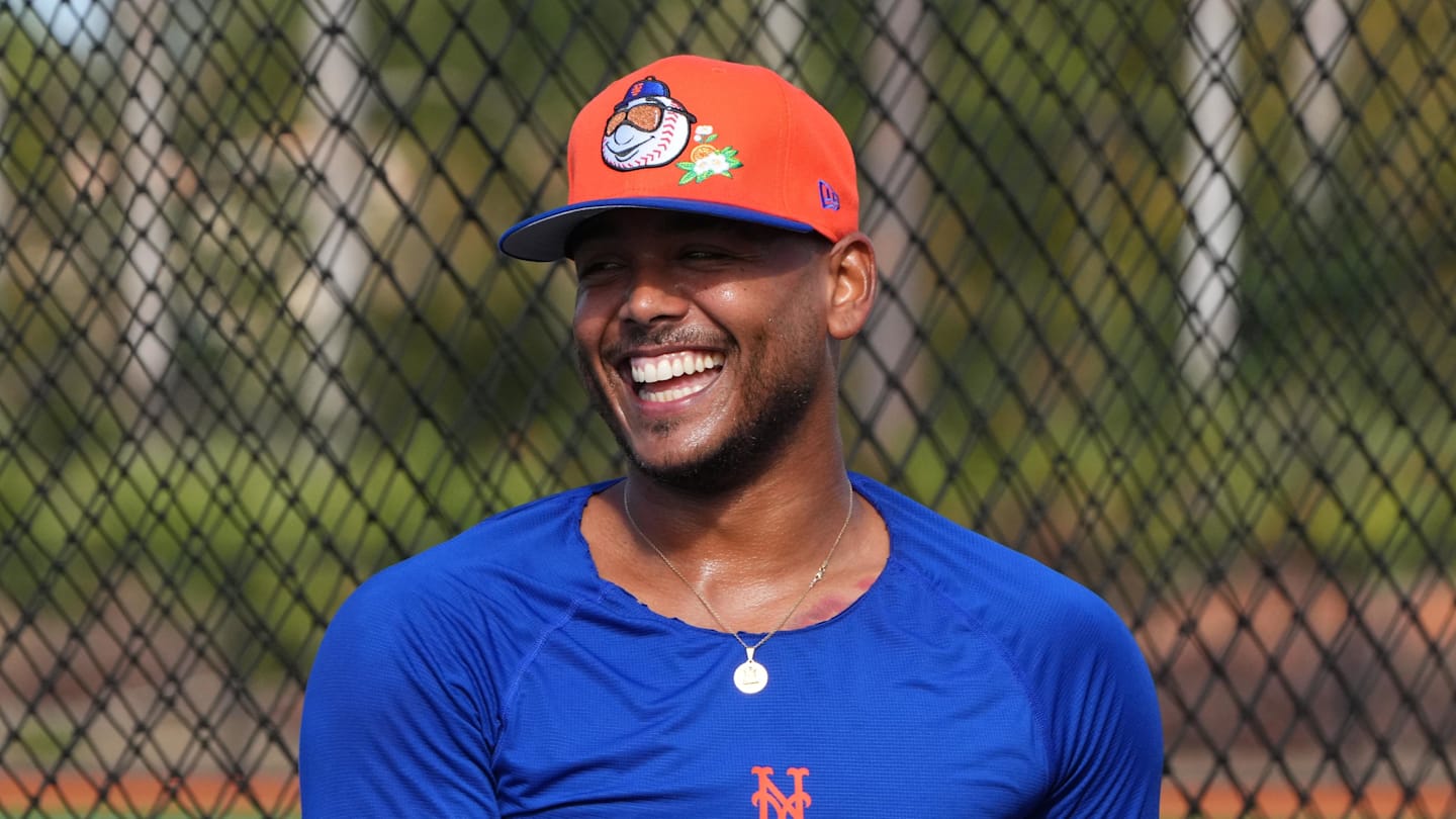 New York Mets pitcher Freddy Peralta (51) warms-up during spring practice.