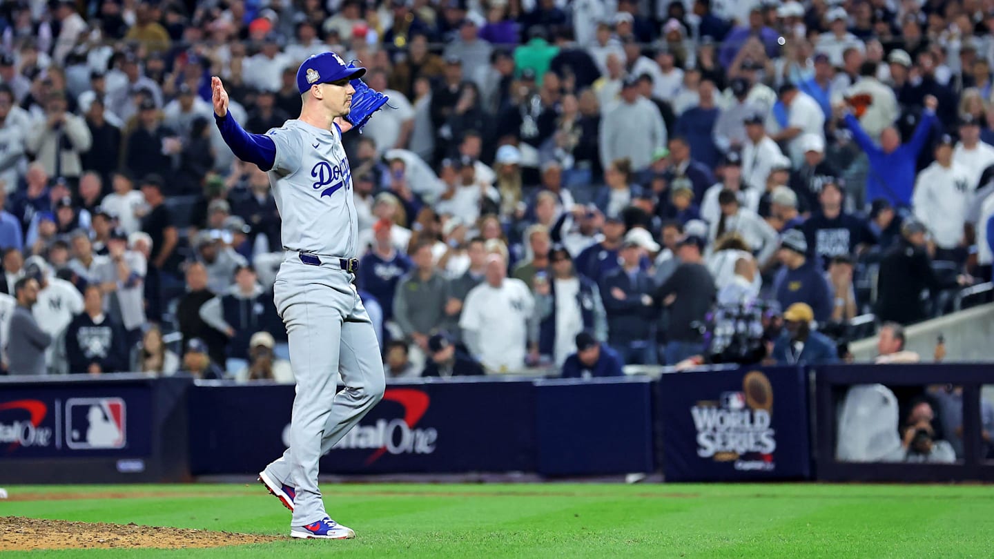 Oct 30, 2024; New York, New York, USA; Los Angeles Dodgers pitcher Walker Buehler (21) celebrates after beating the New York Yankees in game four to win the 2024 MLB World Series at Yankee Stadium. Mandatory Credit: Brad Penner-Imagn Images