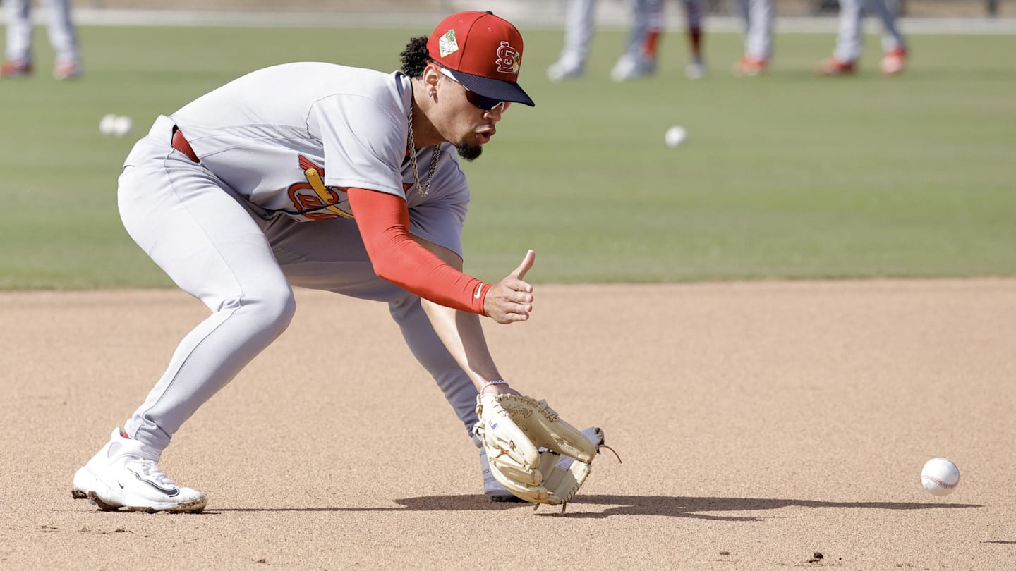 Feb 16, 2026; Jupiter, FL, USA;  St. Louis Cardinals shortstop Masyn Winn (0) fields a ground ball during spring training workouts at Roger Dean Stadium. Mandatory Credit: Reinhold Matay-Imagn Images