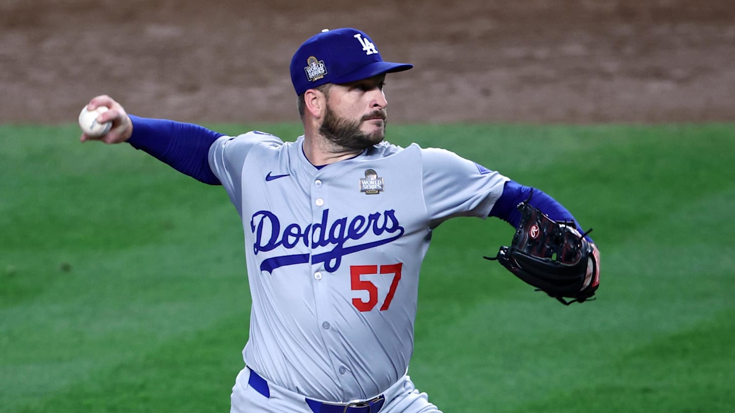 Oct 30, 2024; New York, New York, USA; Los Angeles Dodgers pitcher Ryan Brasier (57) throws during the third inning against the New York Yankees in game five of the 2024 MLB World Series at Yankee Stadium. Mandatory Credit: Wendell Cruz-Imagn Images