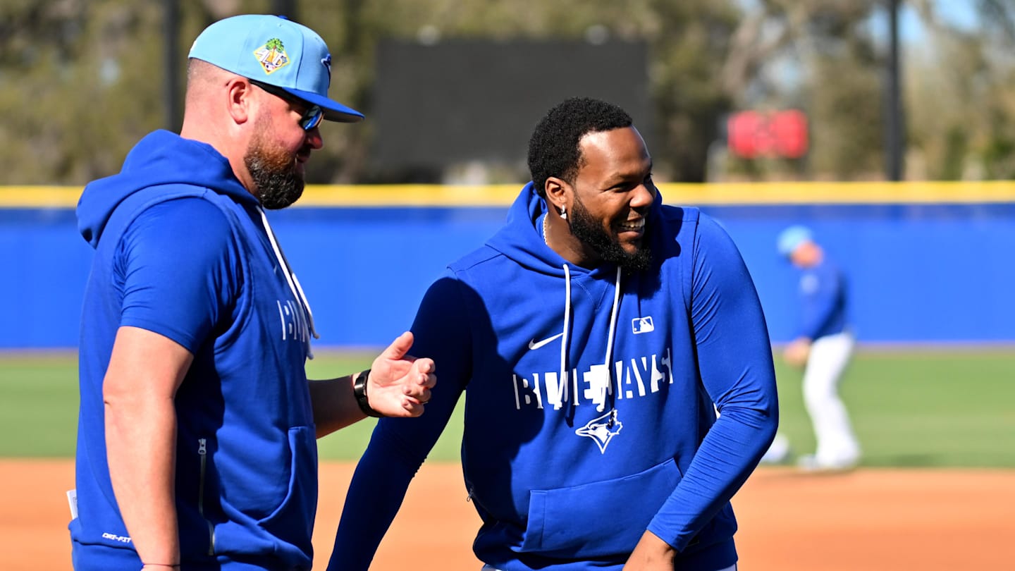 Feb 17, 2026; Dunedin, FL, USA; Toronto Blue Jays infielder Vladimir Guerrero Jr. (27) talks with manager John Schneider (14) during spring training at Bobby Mattick Training Center at Englebert Complex. Mandatory Credit: Jonathan Dyer-Imagn Images