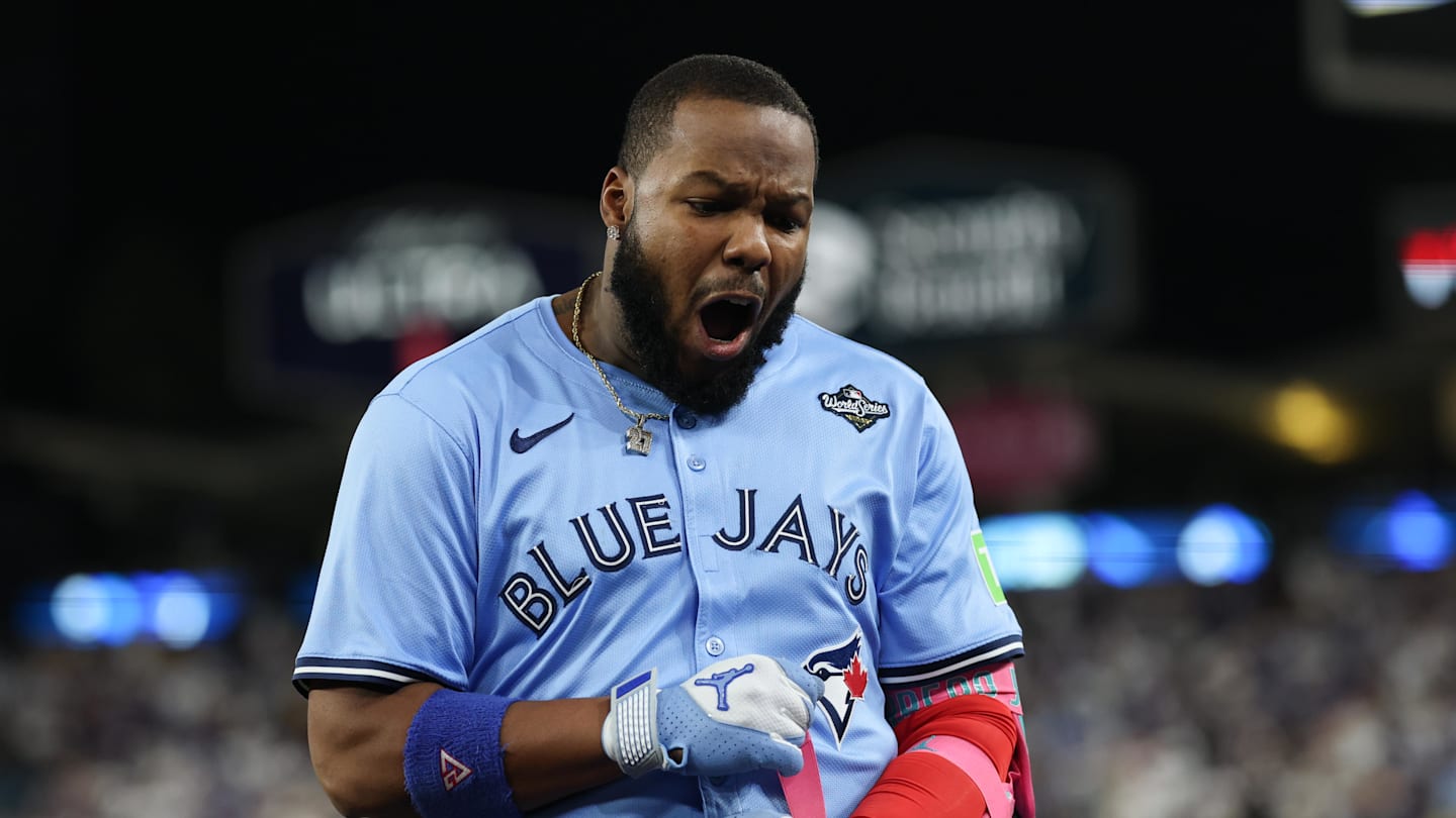 Oct 29, 2025; Los Angeles, California, USA; Toronto Blue Jays first baseman Vladimir Guerrero Jr. (27) reacts after grounding into a double play during the fifth inning against the Los Angeles Dodgers during game five of the 2025 MLB World Series at Dodger Stadium. Mandatory Credit: Kiyoshi Mio-Imagn Images