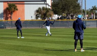 Kevin Kiermaier, center, works with a Rays outfielder in Port Charlotte on Wednesday. (Spectrum Sports 360/Mike Cairns)