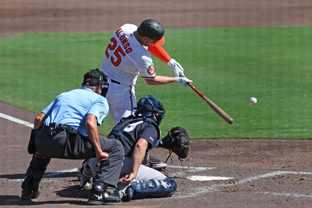 Baltimore Orioles first baseman Pete Alonso #25, flying out to centerfield during the 3rd inning