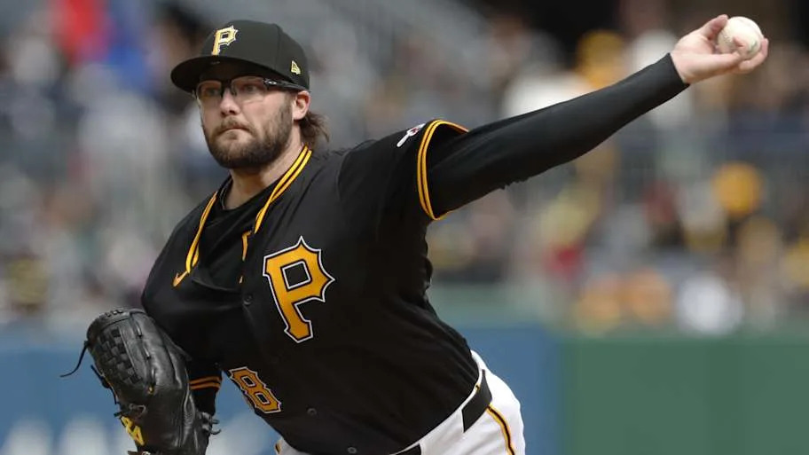 Pittsburgh Pirates relief pitcher Josh Fleming throws a baseball. 
