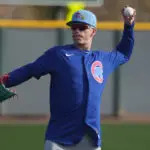 Chicago Cubs center fielder Pete Crow-Armstrong (4) works out during spring training camp at Sloan Park.