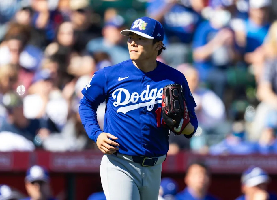 Los Angeles Dodgers pitcher Yoshinobu Yamamoto against the Los Angeles Angels during a spring training game at Tempe Diablo Stadium. Mark J. Rebilas-Imagn Images