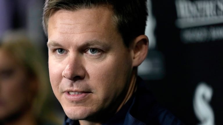 Chicago White Sox general manager Chris Getz talks with reporters...