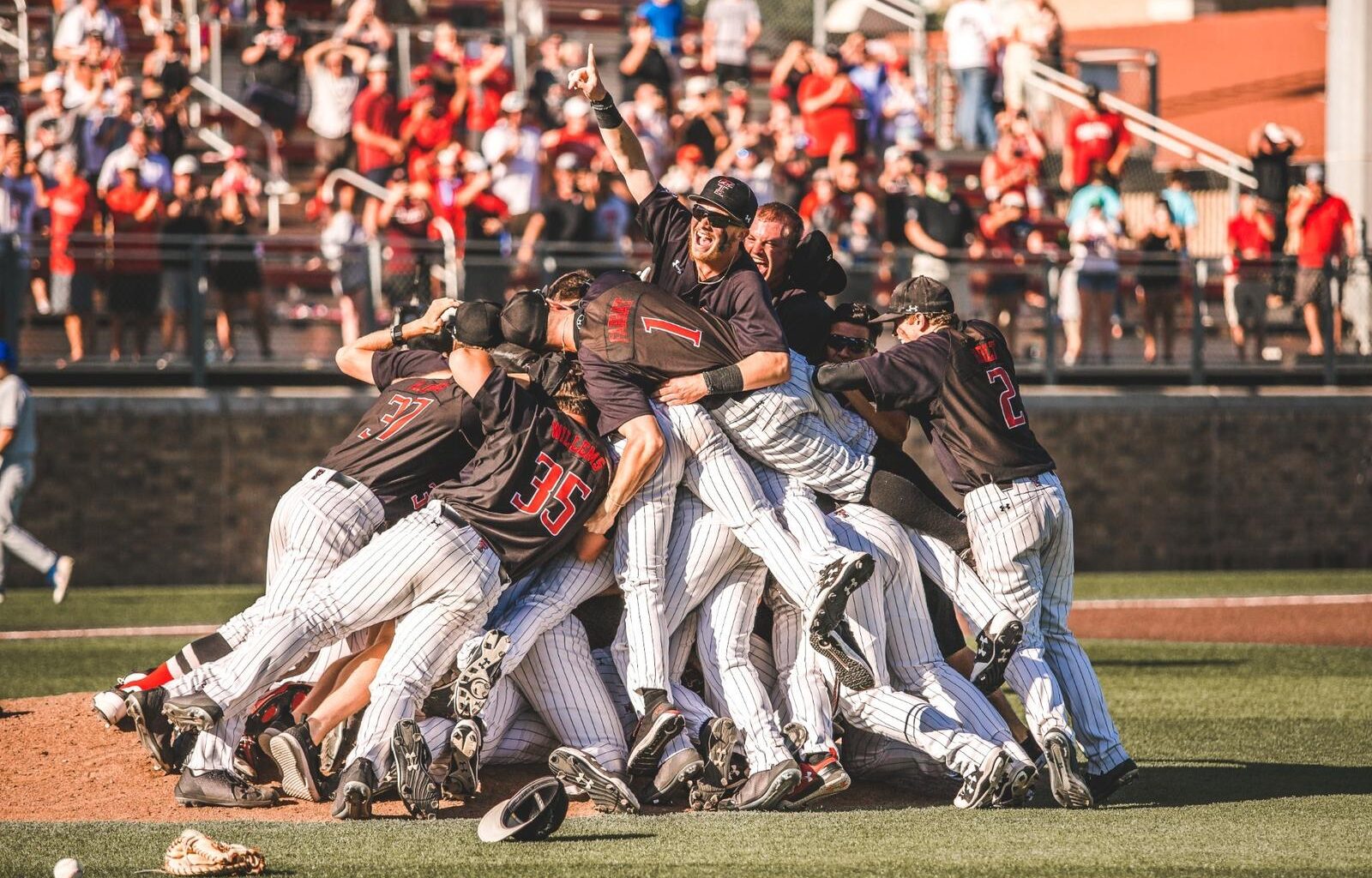 Logan Hughes rounds the bases after one of his two home runs during the 2026 Texas Tech Baseball Alumni Game