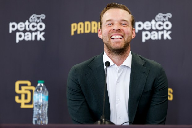 Michael King smiles during a news conference after the Padres re-signed him to a three-year, $75-million contract at Petco Park on Friday, Dec. 19, 2025 in San Diego, California. (Meg McLaughlin / The San Diego Union-Tribune)