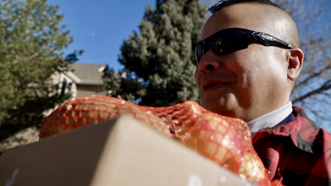 Huy delivering box.jpg