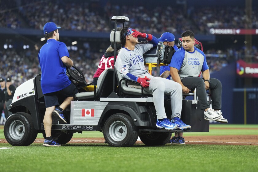 Cubs catcher Miguel Amaya is carted off the field with an injury during the eighth inning of a game against against the Blue Jays in Toronto on Wednesday, Aug. 13, 2025.
