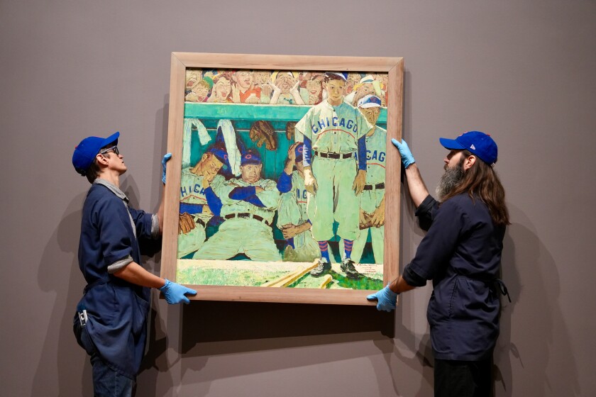 The Art Institute of Chicago installed its first-ever Norman Rockwell painting on Tuesday. “The Dugout” shows dejected Chicago Cubs players whose faces hang long after losing a doubleheader against the Boston Braves.