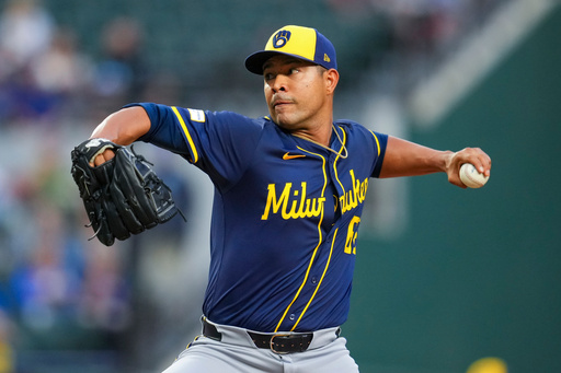 FILE - Milwaukee Brewers starting pitcher Jose Quintana throws against the Texas Rangers during the first inning of a baseball game Sept. 8, 2025, in Arlington, Texas. (AP Photo/Julio Cortez, File)