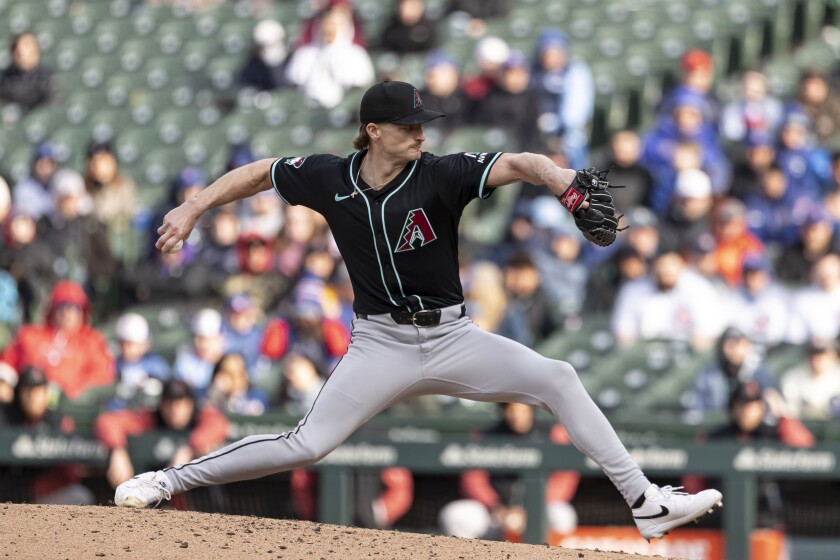 The Diamondback's Shelby Miller delivers a pitch in the ninth inning against the Cubs at Wrigley Field on April 20, 2025.