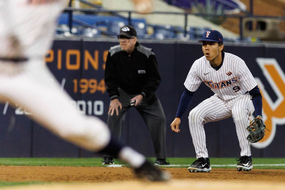 CSUF infielder Cameron Kim (9) stays ready before the pitch during an NCAA Baseball game against the CBU Lancers on February 13, 2026 in Fullerton, California.