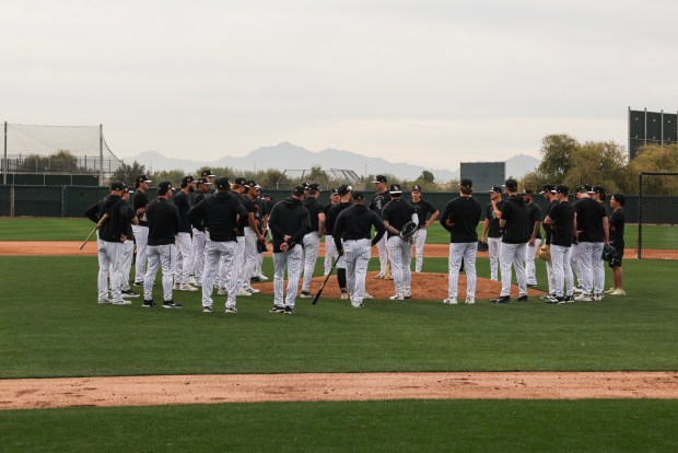 White Sox players huddle up during spring training at Camelback Ranch on Monday, Feb. 16, 2026, in Glendale, Ariz. (Eileen T. Meslar/Chicago Tribune)