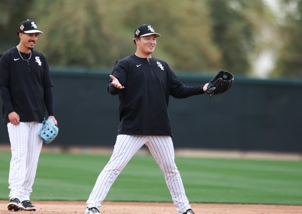 White Sox third baseman Miguel Vargas laughs as infielder Munetaka Murakami asks to field another ball during spring training at Camelback Ranch on Monday, Feb. 16, 2026, in Glendale, Ariz. (Eileen T. Meslar/Chicago Tribune)