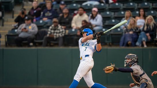 UCLA infielder, Roman Martin (7), at bat, mid-hit during a NCAA baseball game against UC San Diego on February 13, 2026 at Jackie Robinson Stadium in Los Angeles, CA. UCLA infielder, Roman Martin (7), at bat, mid-hit during a NCAA baseball game against UC San Diego on February 13, 2026 at Jackie Robinson Stadium in Los Angeles, CA.