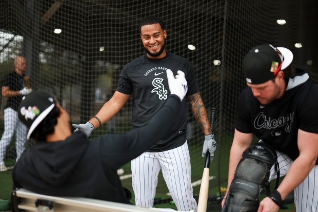 White Sox players Lenyn Sosa, center, and Everson Pereira, left, chat outside the batting cages during spring training at Camelback Ranch on Monday, Feb. 16, 2026, in Glendale, Ariz. (Eileen T. Meslar/Chicago Tribune)
