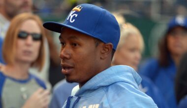 Terrance Gore wearing a Royals hat