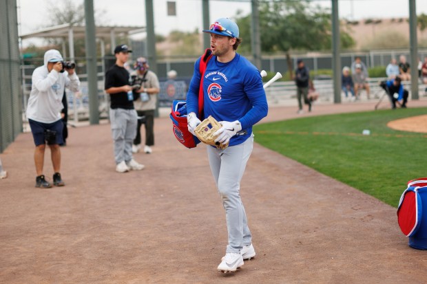 Nico Hoerner leaves a practice field after taking batting practice during the first day of the Cubs full-squad workout at spring training at Sloan Park on Feb. 16, 2026, in Mesa, Ariz. (Armando L. Sanchez/Chicago Tribune)