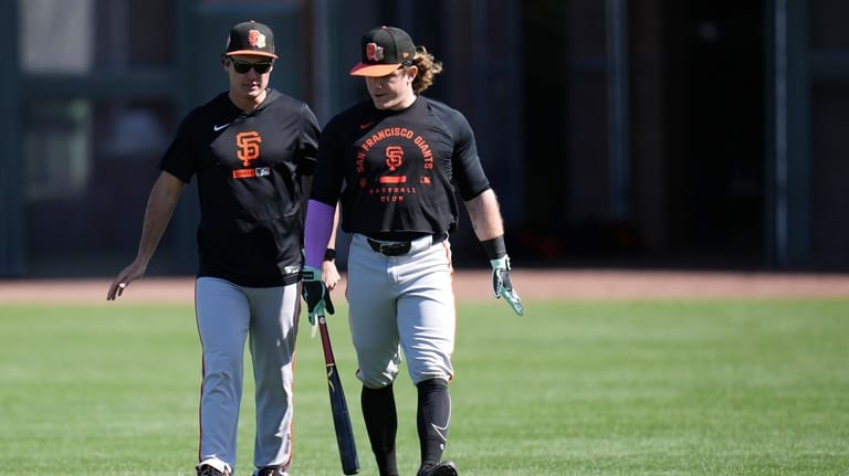 San Francisco Giants field coordinator and catching coach Alex Burg,...