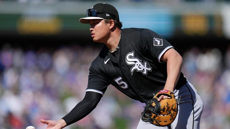 Chicago White Sox first baseman Munetaka Murakami, of Japan, tosses...