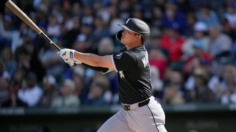 Chicago White Sox's Munetaka Murakami, of Japan, watches the flight...
