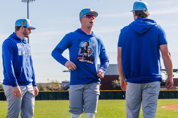 Cubs center fielder Pete Crow-Armstrong wears a shirt with a photo of himself and Seiya Suzuki during warmups at spring training at Sloan Park on Feb. 19, 2026, in Mesa, Ariz. (Armando L. Sanchez/Chicago Tribune)