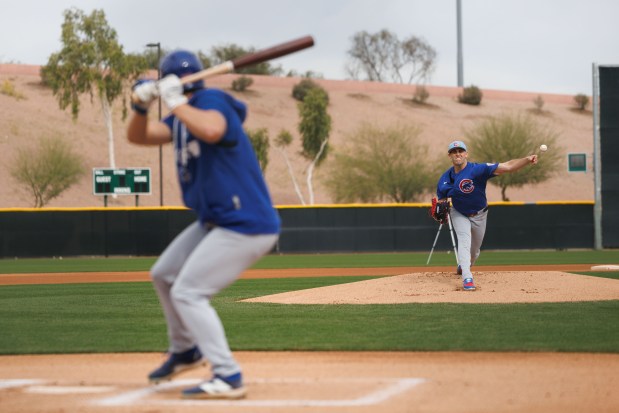 Pitcher Matthew Boyd throws to non-roster invitee Brett Bateman during live batting practice on the first day of the Cubs full-squad workout at spring training at Sloan Park on Feb. 16, 2026, in Mesa, Ariz. (Armando L. Sanchez/Chicago Tribune)