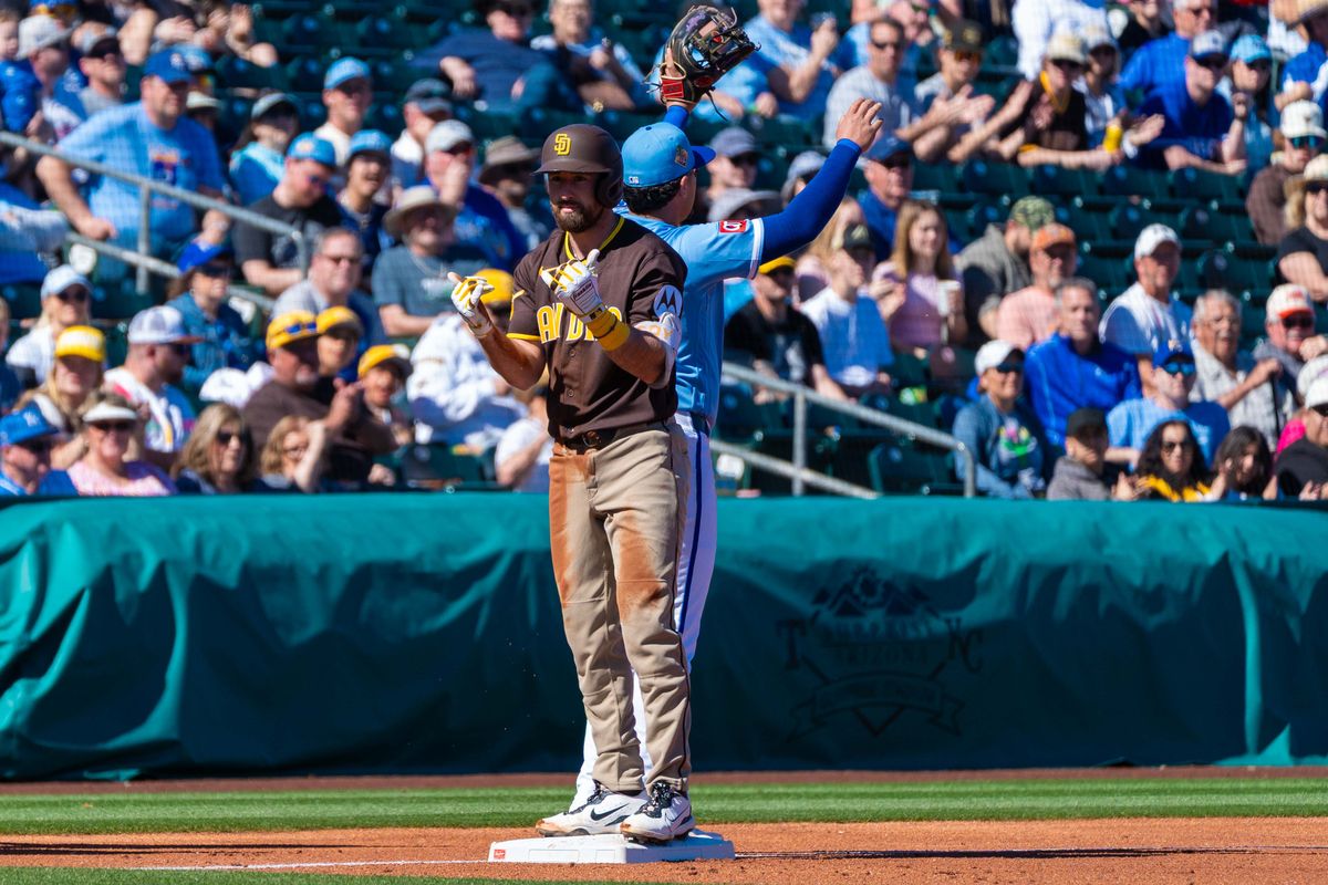 San Diego Padres infielder Mason McCoy (18) celebrates a triple during an MLB Spring Training game between the San Diego Padres and the Kansas City Royals, Saturday February 21, 2026 at Surprise Stadium in Surprise, AZ. San Diego Padres infielder Mason McCoy (18) celebrates a triple during an MLB Spring Training game between the San Diego Padres and the Kansas City Royals, Saturday February 21, 2026 at Surprise Stadium in Surprise, AZ.