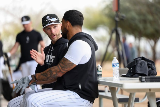 White Sox hitting director Ryan Fuller, left, speaks with second baseman Lenyn Sosa during spring training at Camelback Ranch on Feb. 18, 2026, in Glendale, Ariz. (Eileen T. Meslar/Chicago Tribune)