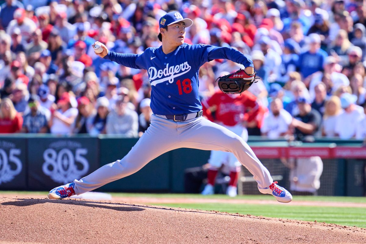 The Los Angeles Dodgers pitcher Yoshinobu Yamamoto (18) pitches against the Los Angeles Angels, February 21st, 2026 in Tempe Arizona.