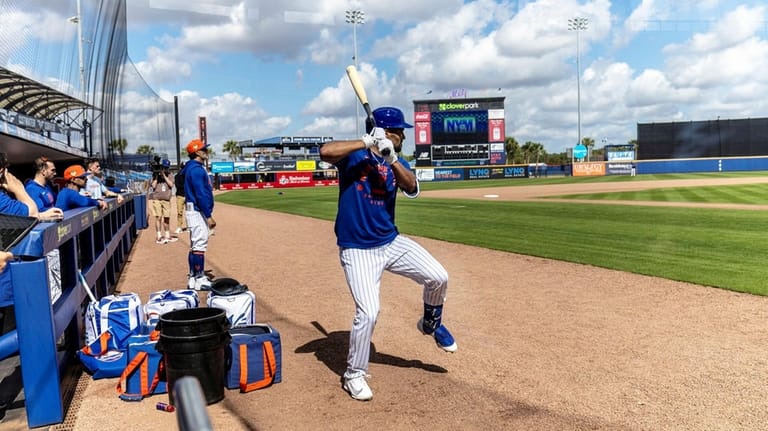 New York Mets player Marcus Semien works out during spring...