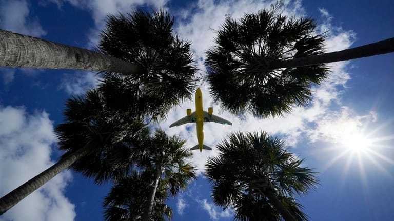 An airliner lands at Tampa International Airport.