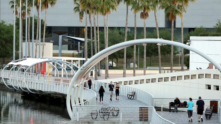 People take advantage of a beautiful spring morning as they...