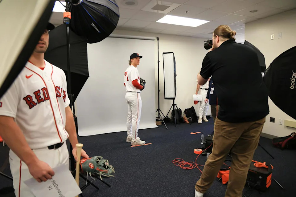 Feb 17, 2026; Lee County, FL, USA; Boston Red Sox pitcher Connelly Early (71) gets his photo taken during media day at JetBlue Park. (Kim Klement Neitzel/Imagn Images)