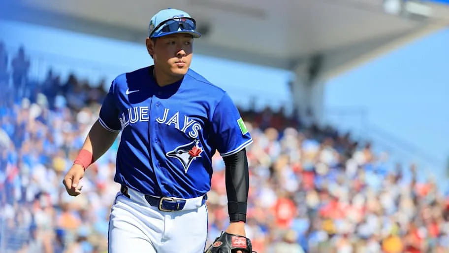 Toronto Blue Jays infielder Kazuma Okamoto looks on.