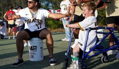 Pirates players, coaches participate in annual Miracle League event