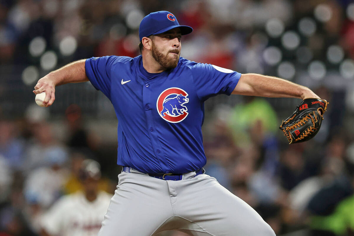 FILE - Chicago Cubs pitcher Aaron Civale delivers in the seventh inning of a baseball game agai ...